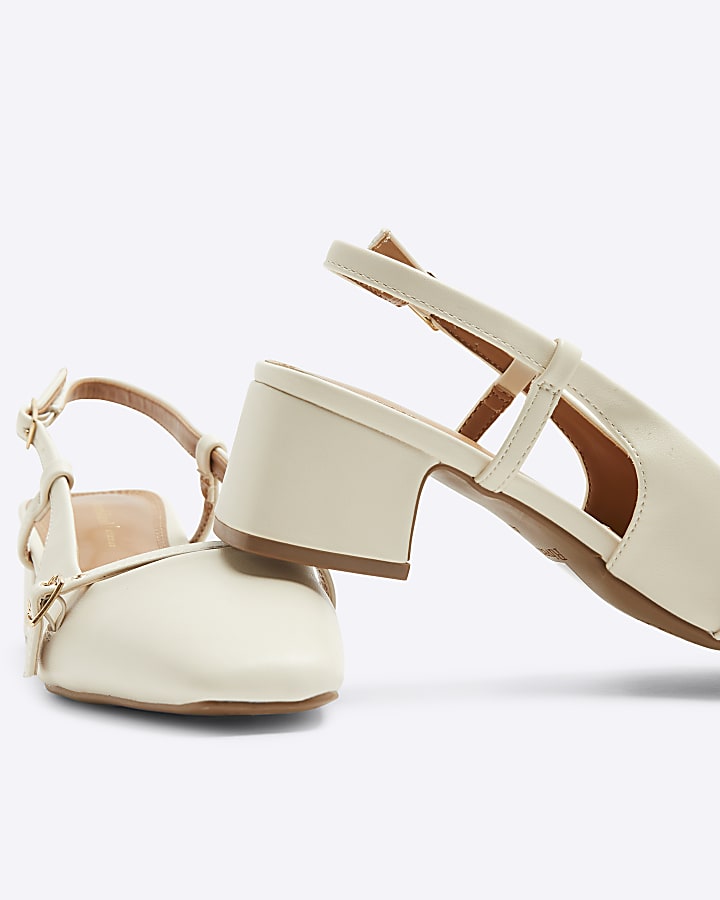 Beige buckle sling back heeled court shoes