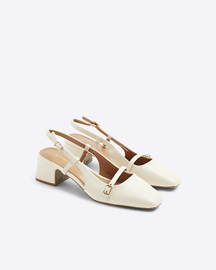 Beige buckle sling back heeled court shoes