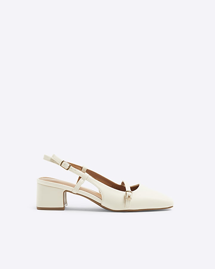 Beige buckle sling back heeled court shoes