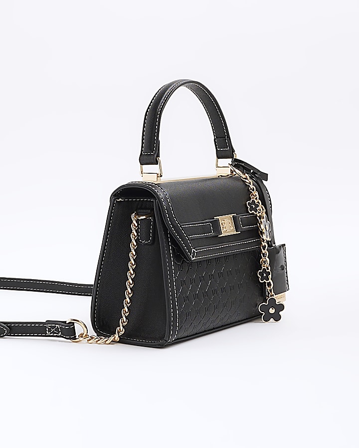 Black embossed mini top handle cross body bag