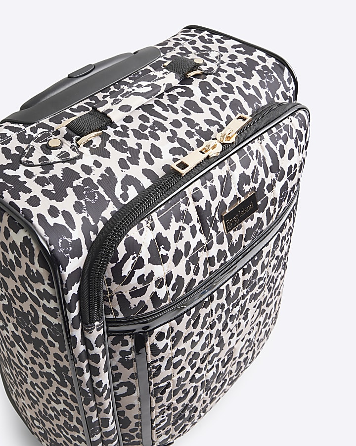 Beige leopard print suitcase