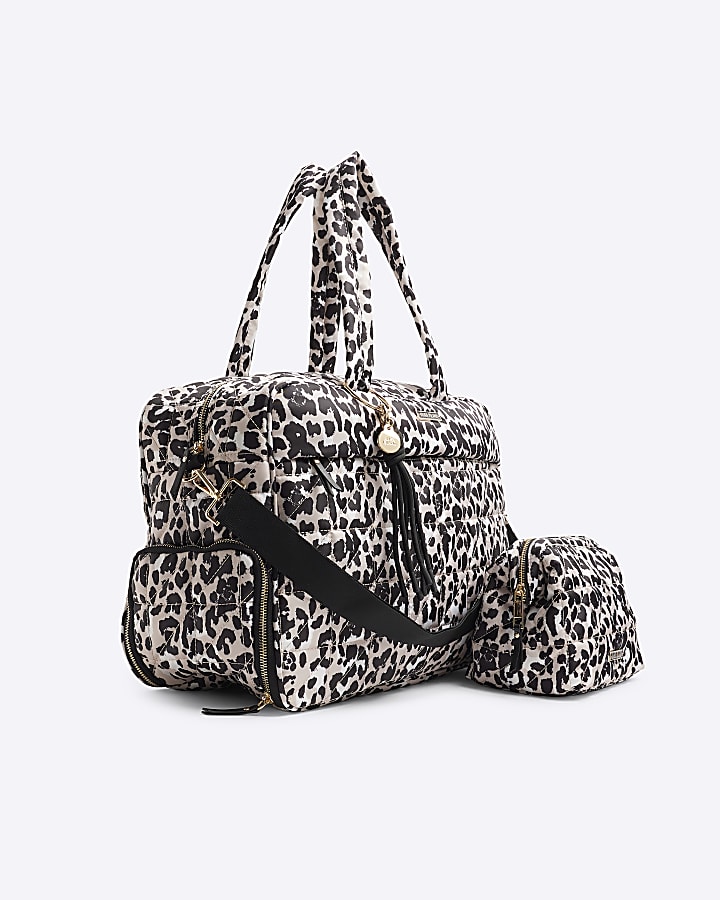 Beige quilted leopard travel and makeup bag