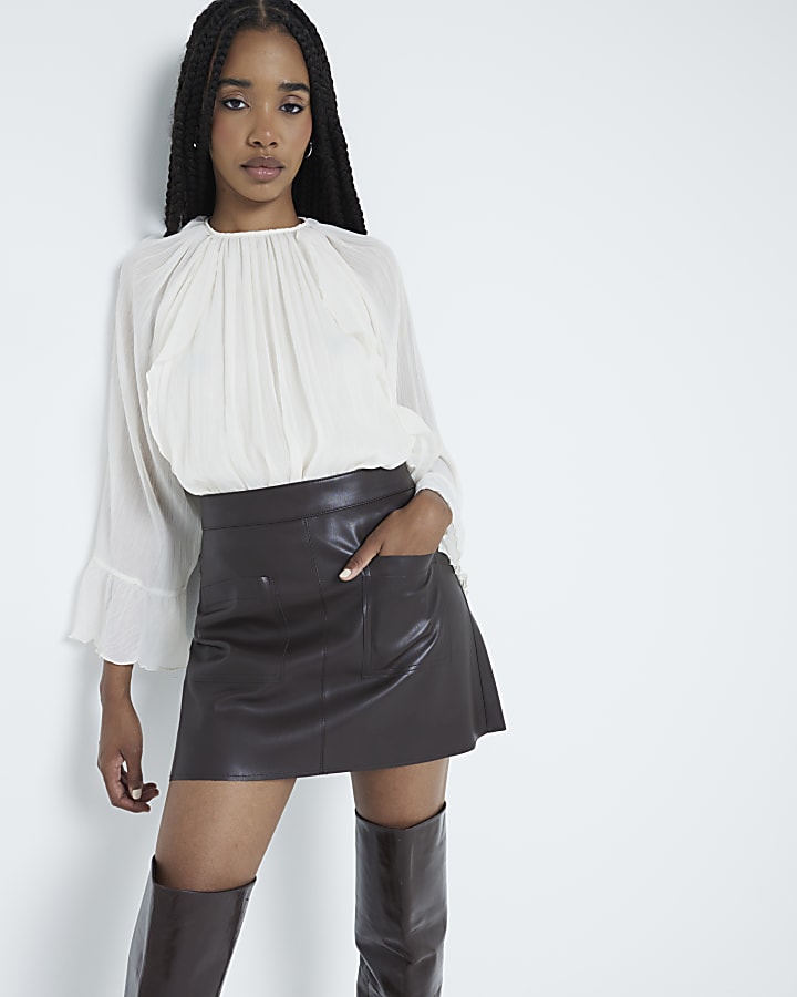 Brown faux leather pocket mini skirt