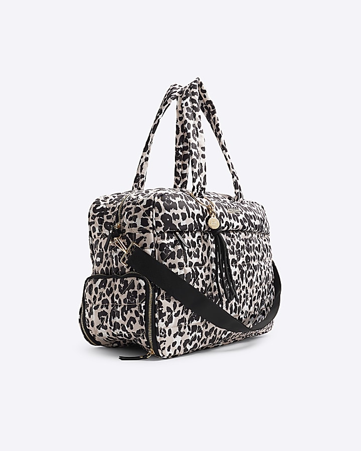 Beige quilted leopard print travel bag