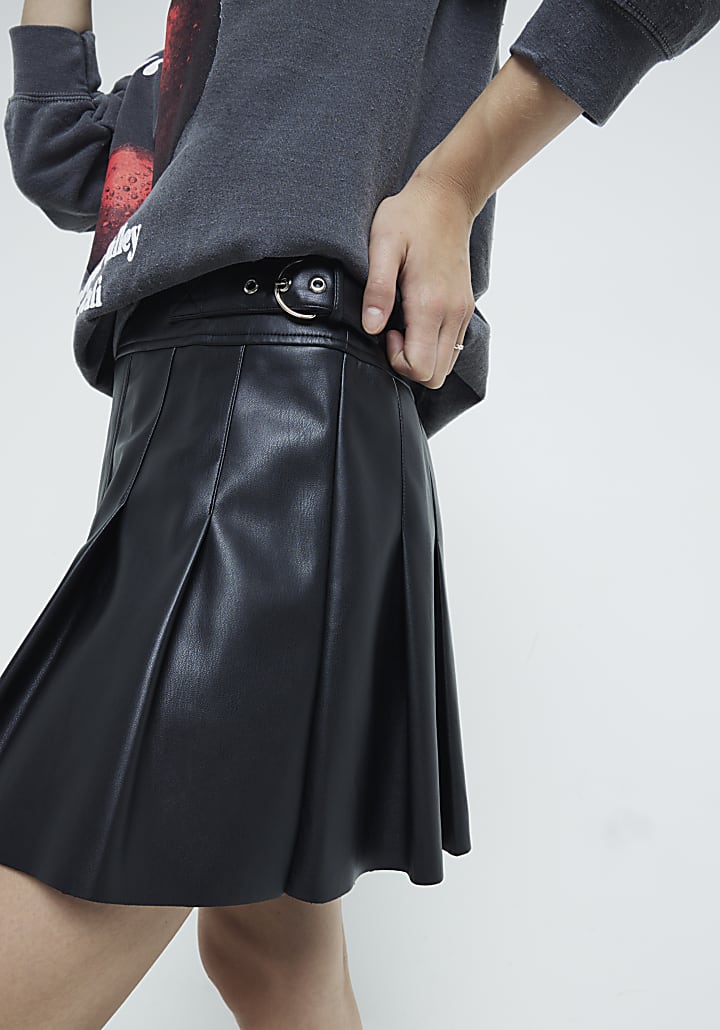 Black faux leather pleated mini skirt