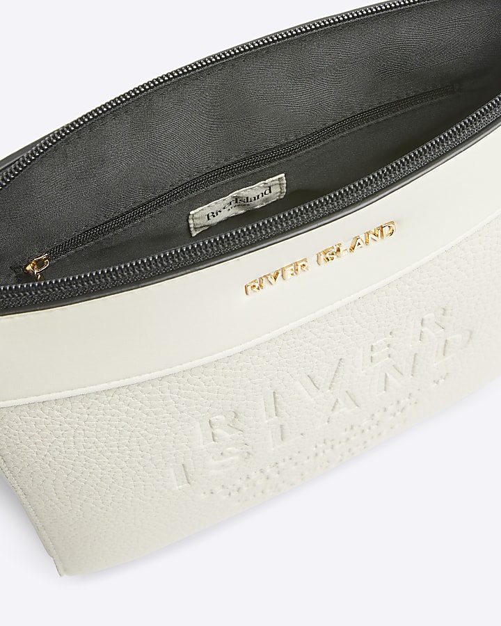 Cream embossed cross body bag