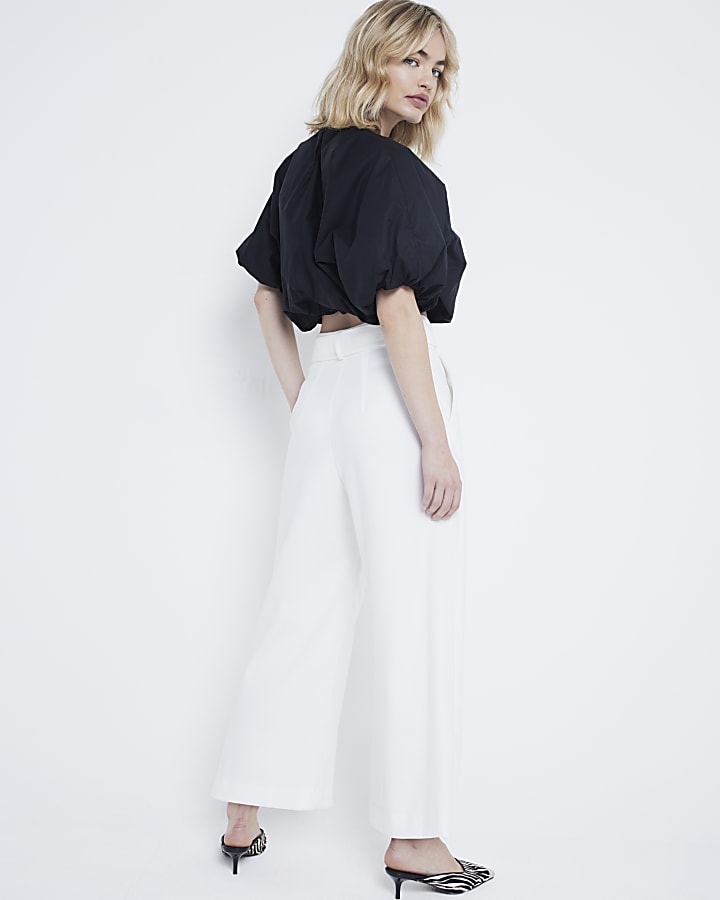White wide leg pleated cropped trousers