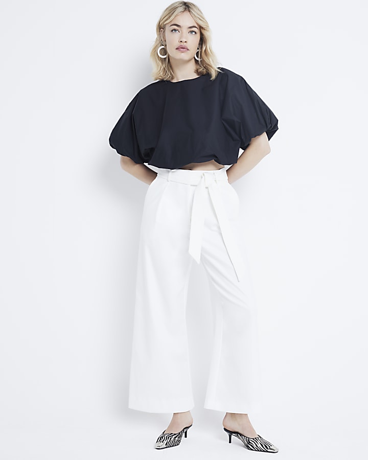 White wide leg pleated cropped trousers