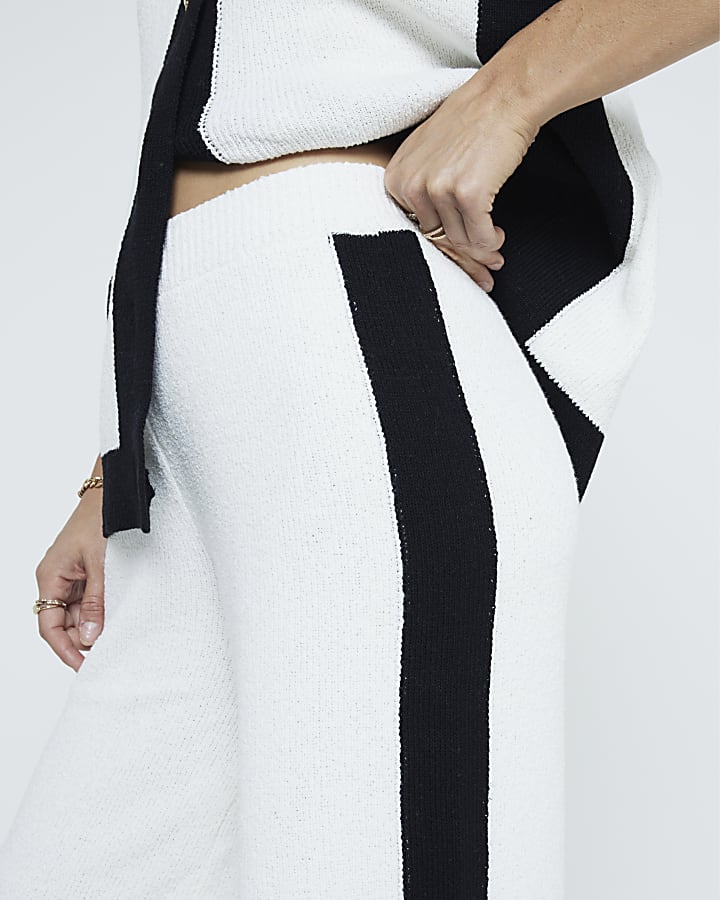 Cream side stripe knit trousers