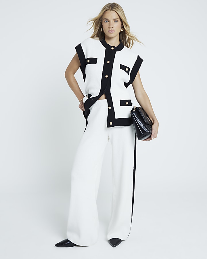 Cream side stripe knit trousers