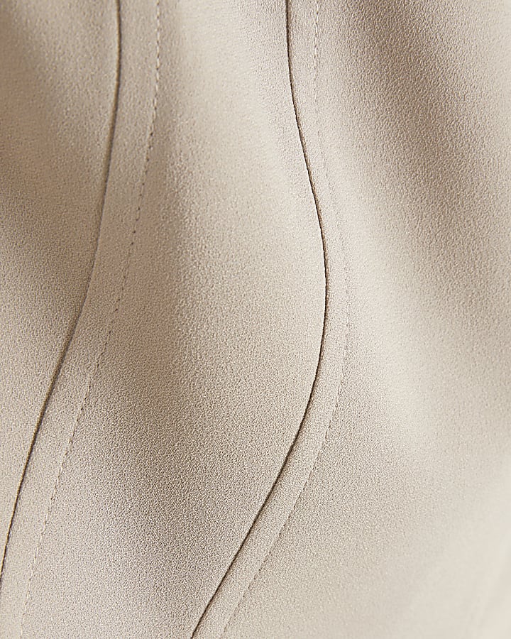 Beige tailored peplum top