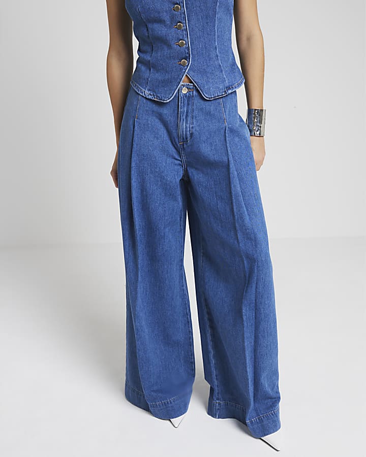 Blue mid rise pleated wide leg jeans