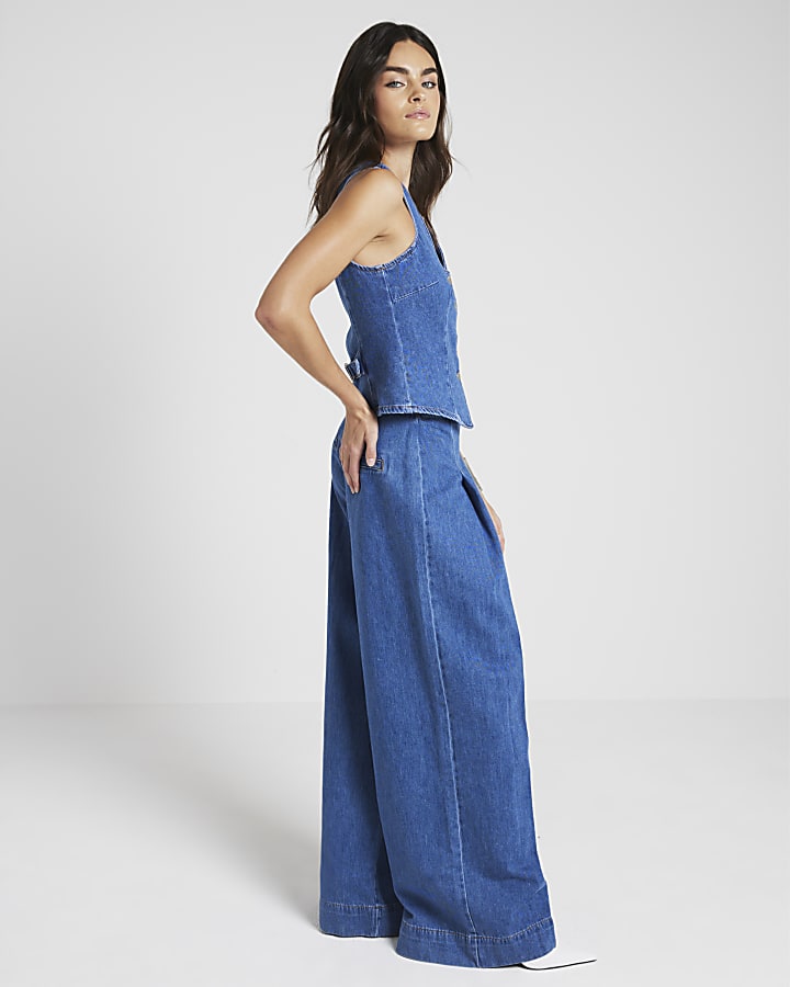 Blue mid rise pleated wide leg jeans