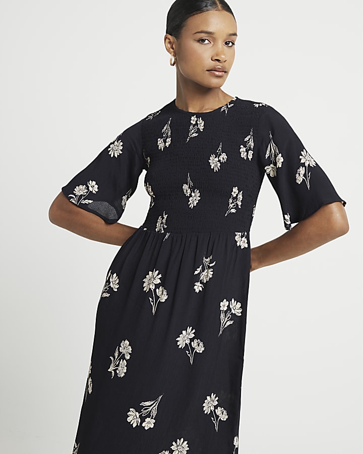 Black floral flute sleeve swing midi dress