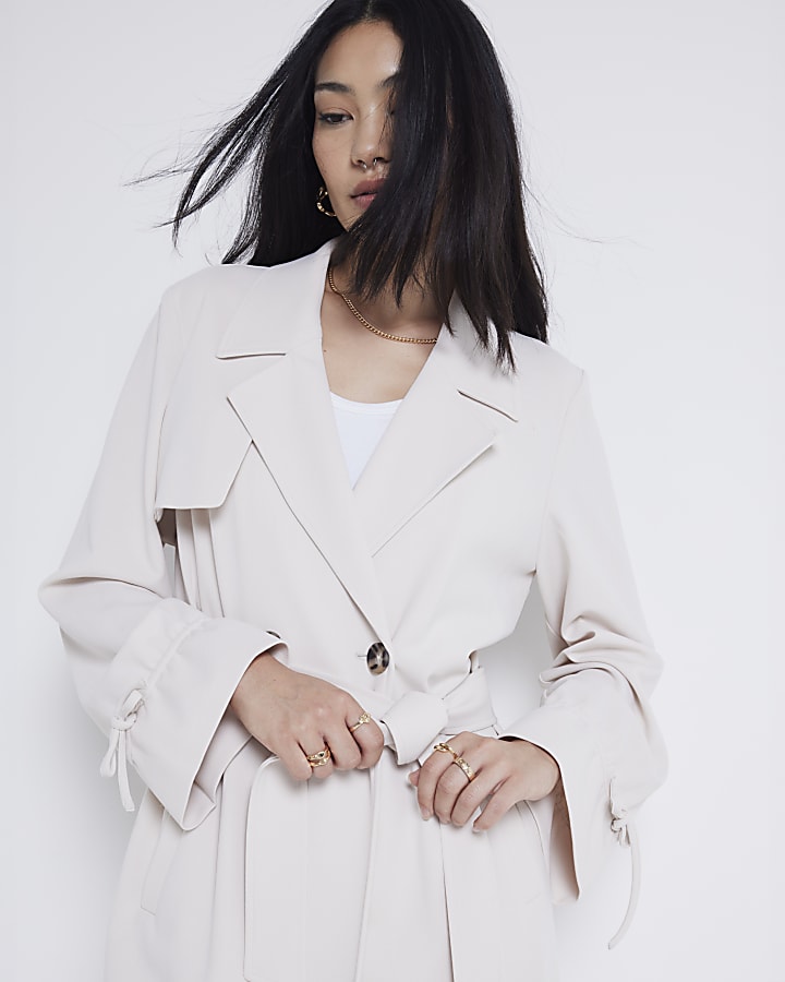 Beige tie cuff belted trench coat