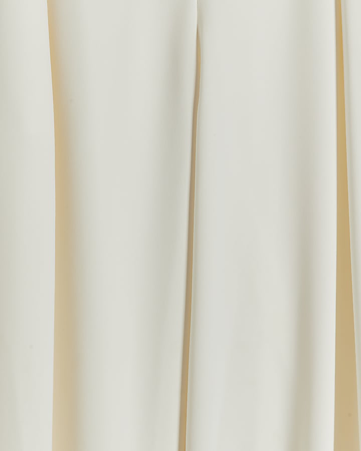 Cream pleated wide leg trousers