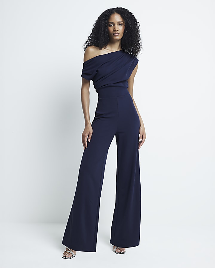 Navy drape off shoulder jumpsuit River Island