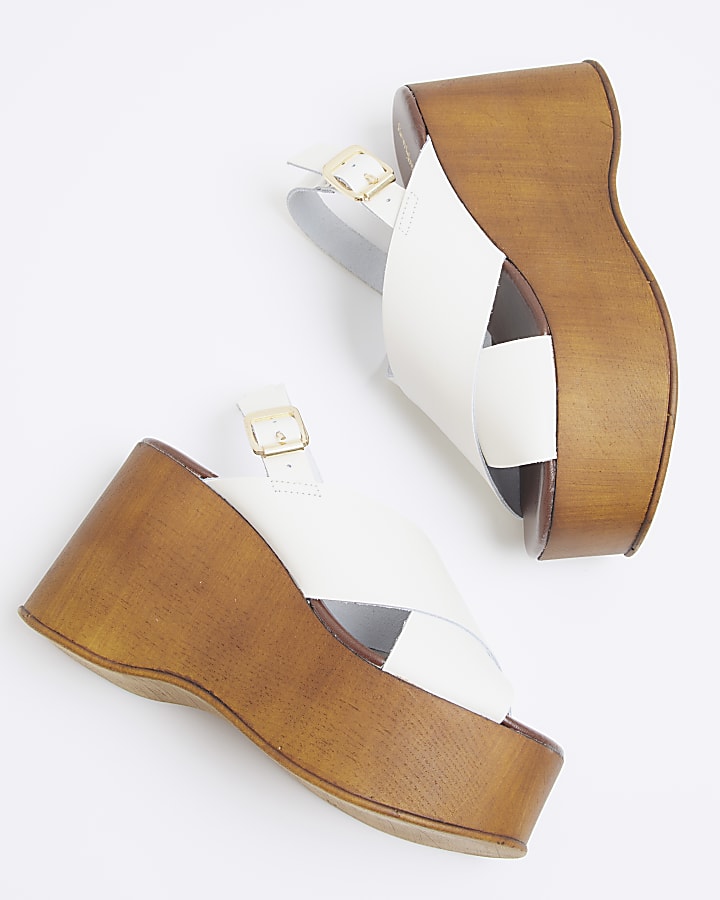 Beige leather cross strap wedge sandals