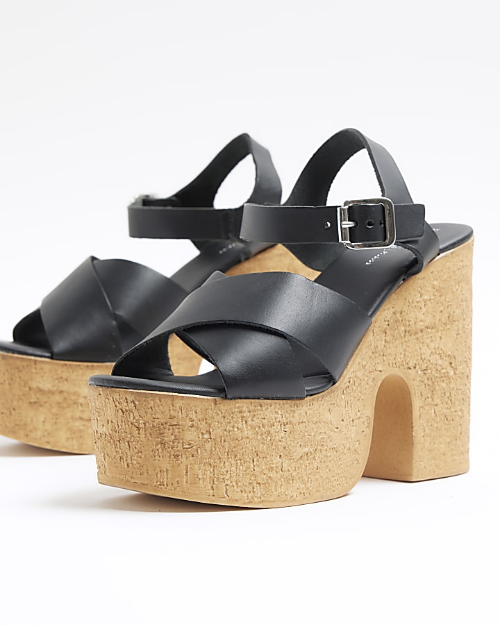 Black leather platform heeled sandals