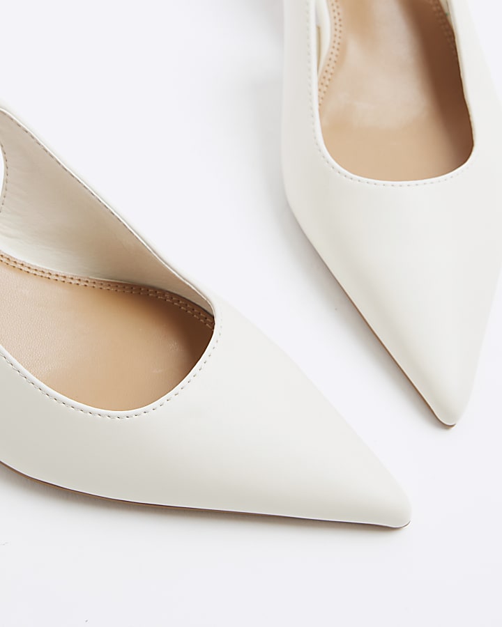 Cream heeled sling back court shoes