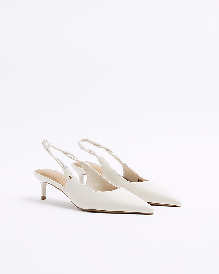 Cream heeled sling back court shoes