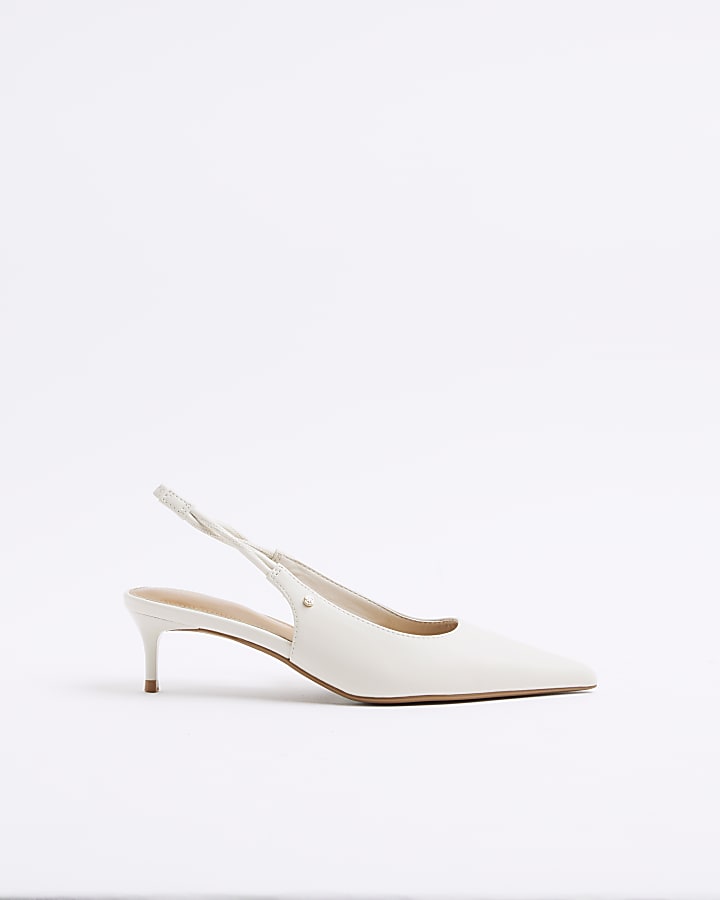 Cream heeled sling back court shoes