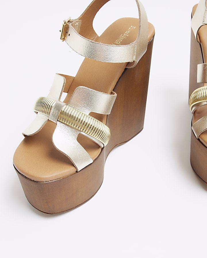 Gold leather strappy wedge sandals