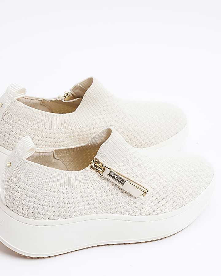 Beige wide fit knitted wedge trainers