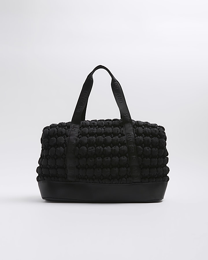 Black quilted texture travel bag