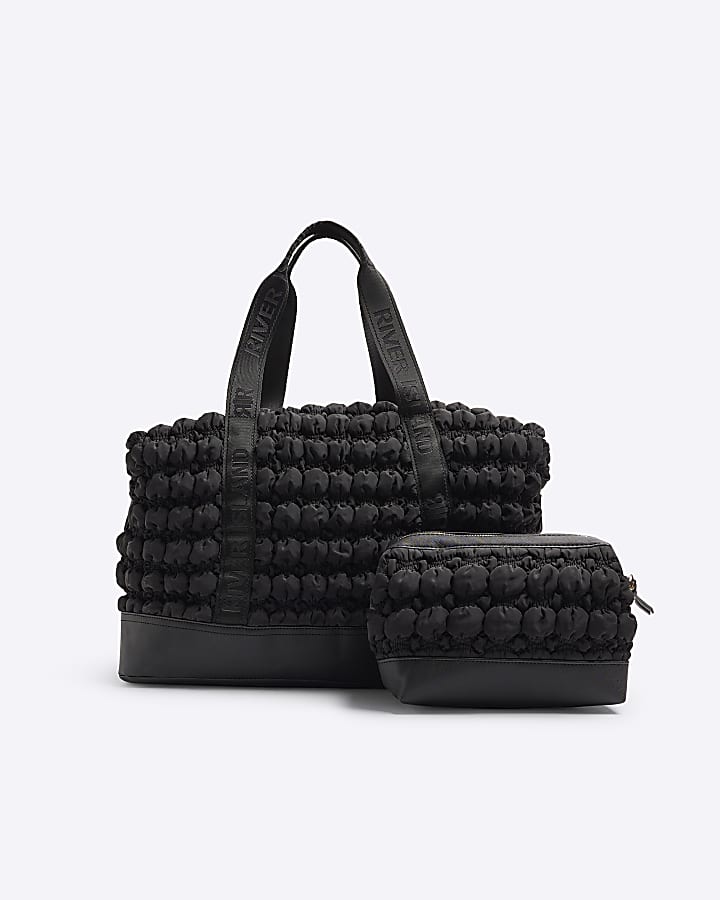 Black quilted texture travel and makeup bag