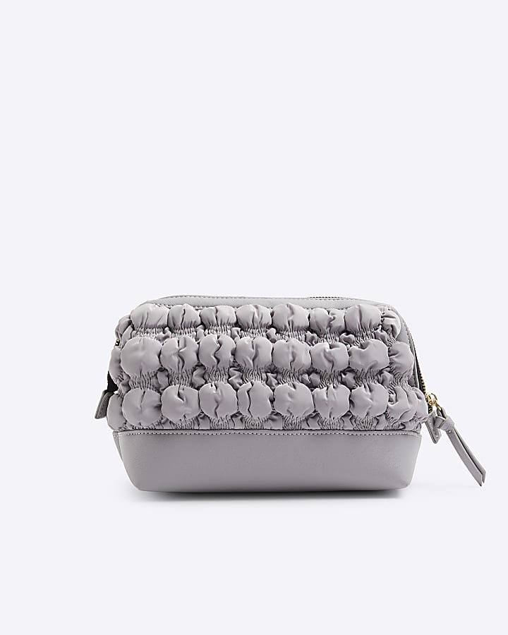 Grey quilted makeup bag