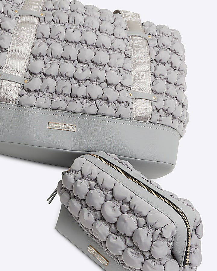 Grey quilted texture travel and makeup bag