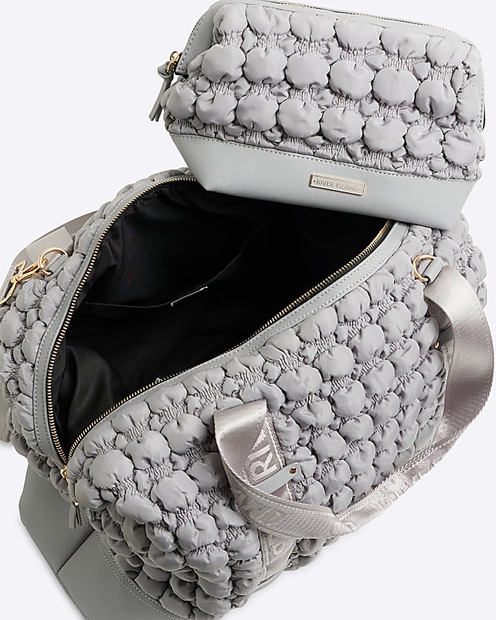 Grey quilted texture travel and makeup bag