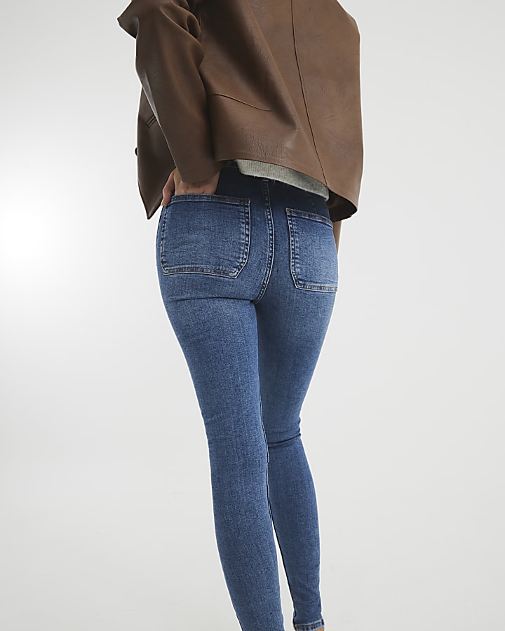 Blue high waisted pocket super skinny jeans