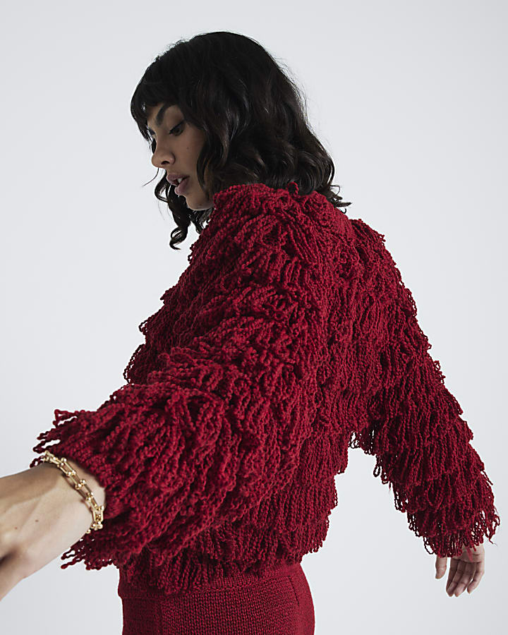 Red knit fringe jumper