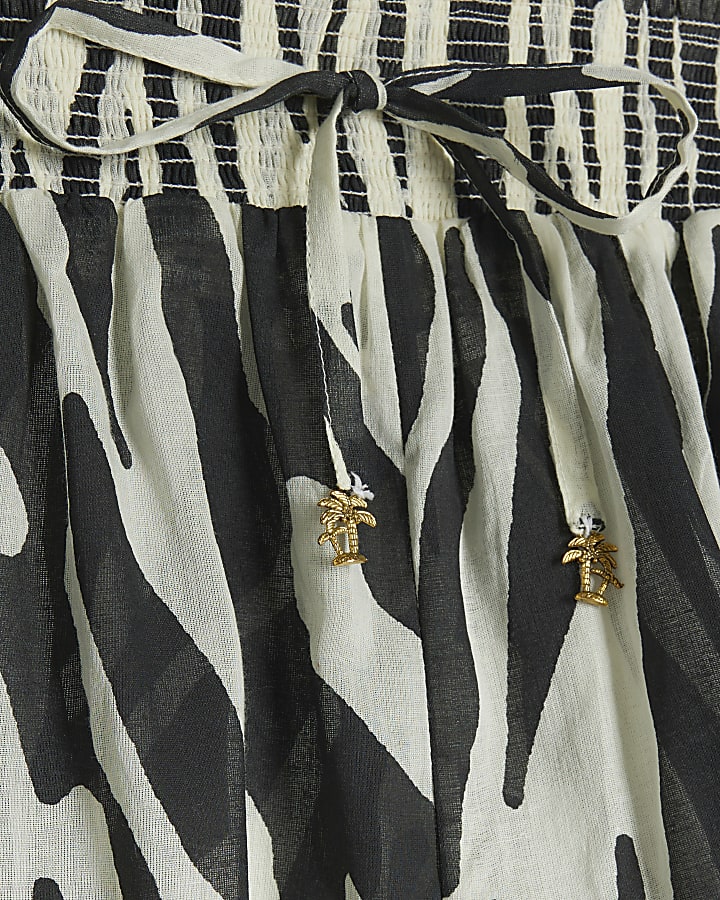 Black zebra print shirred beach shorts