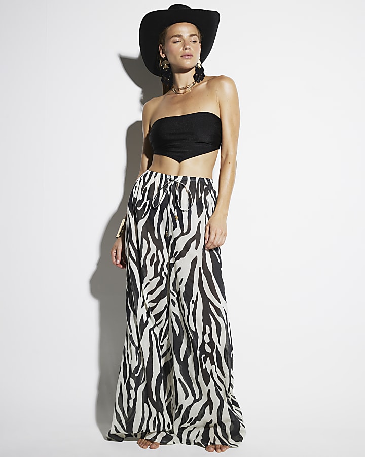 Black zebra print wide leg beach trousers