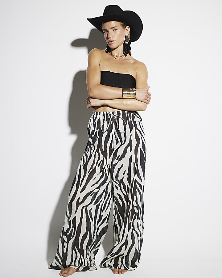 Black zebra print wide leg beach trousers