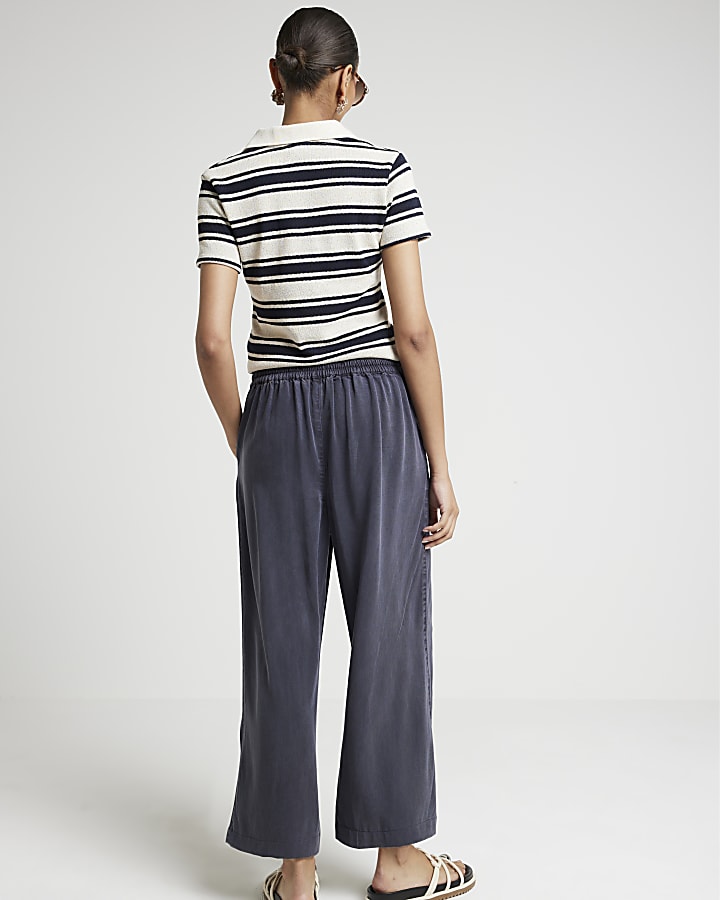 Navy lyocell crop wide leg trousers