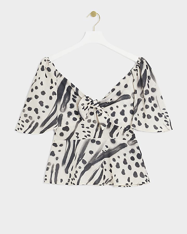 Cream abstract tie front blouse