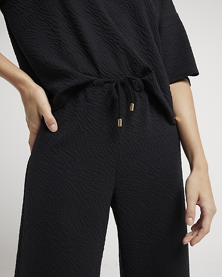 Black textured wide leg drawstring trousers