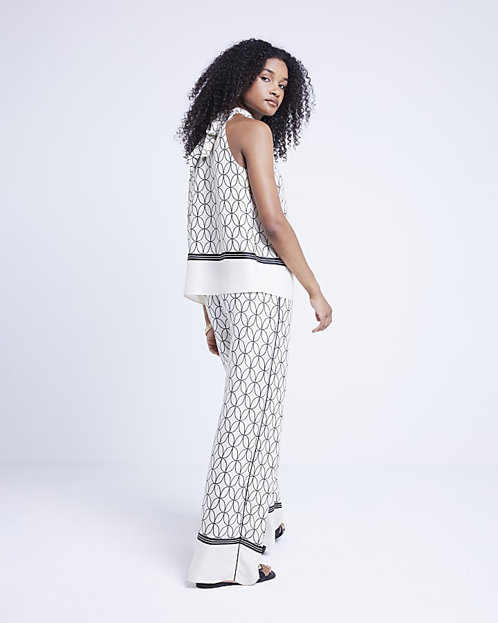 White geometric wide leg trousers