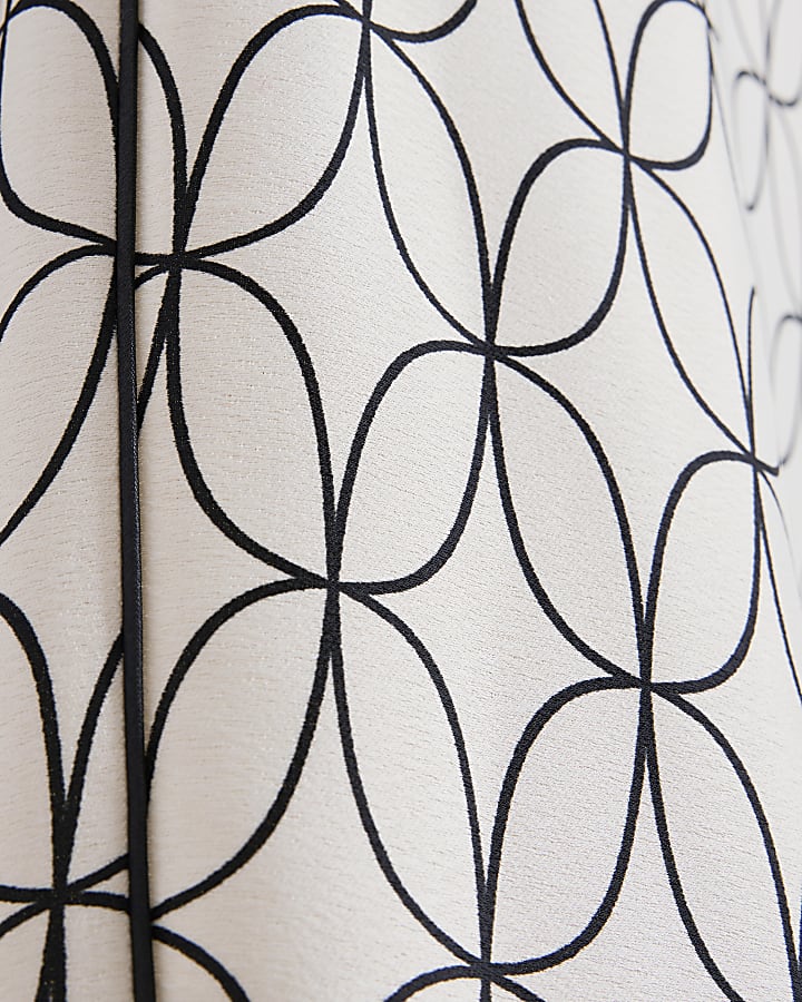 White geometric wide leg trousers