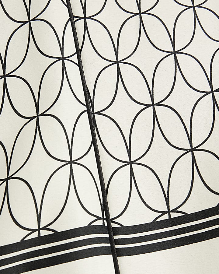 Plus White geometric print wide leg trousers