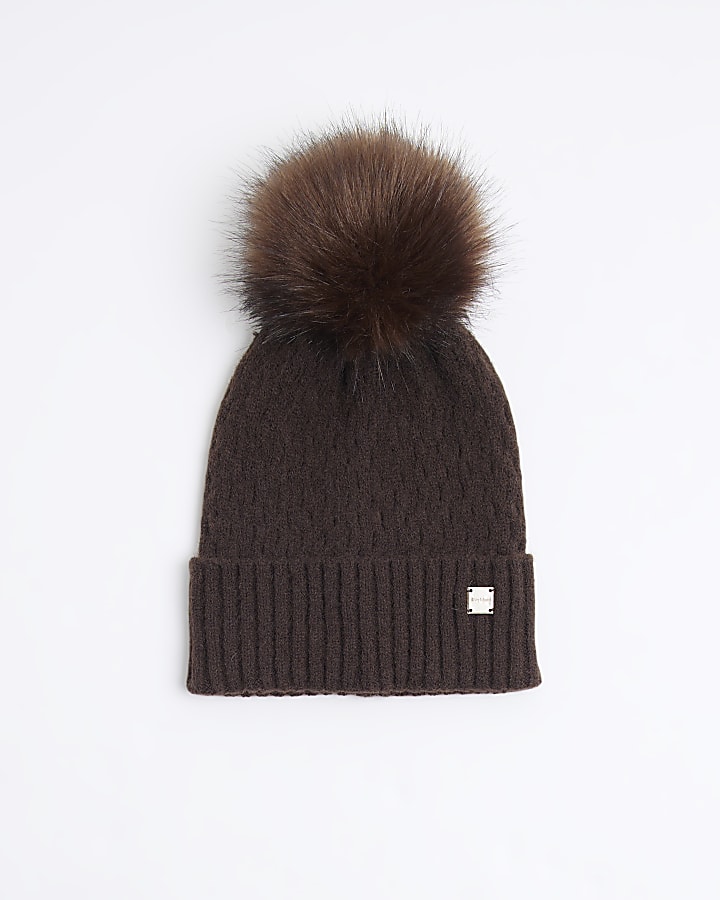 Brown pom pom cable knit beanie hat