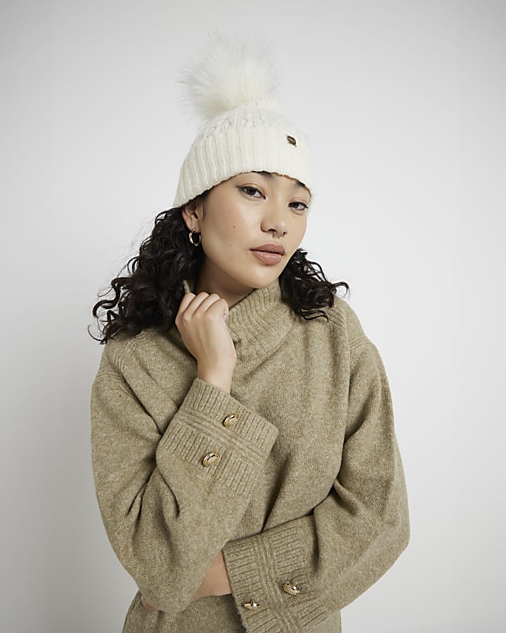 Cream pom pom cable knit beanie hat