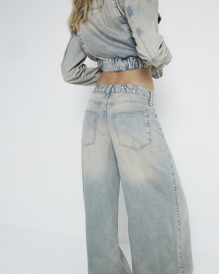 Grey mid rise faded wide leg jeans