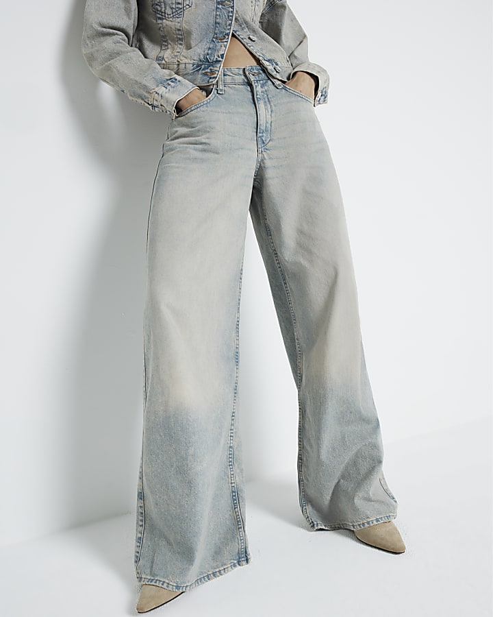 Grey mid rise faded wide leg jeans
