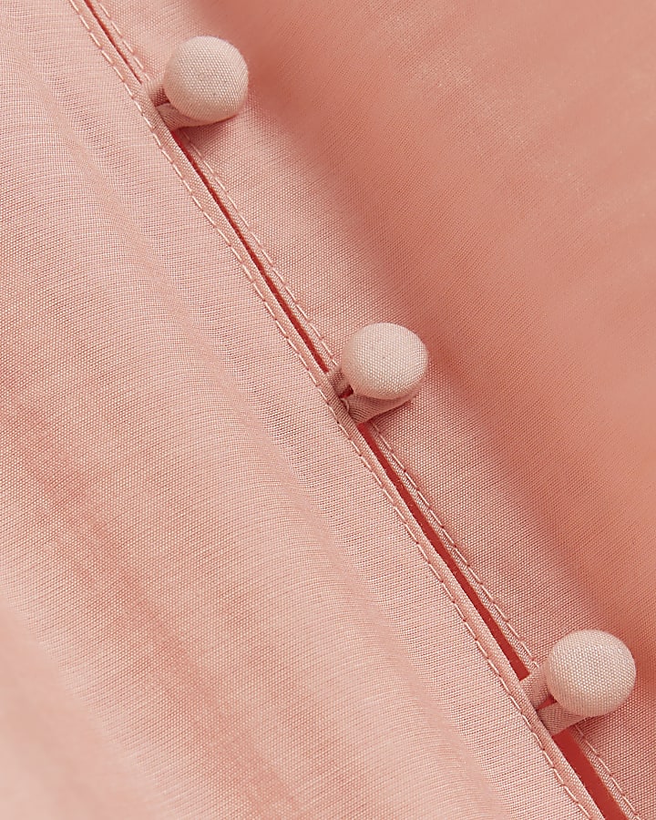 Pink frill button up shirt