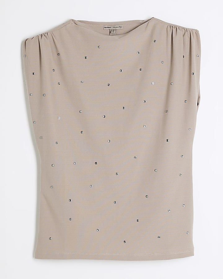 Beige embellished shoulder padded top